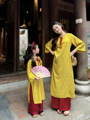 Áo dài Mai Vàng - Áo dài lụa gấm hoa vàng phối quần đỏ cho mẹ và bé gái 7 images upload woo2F62be75a45e9feff181d2a513aa3e6f35